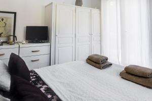 Ένα ή περισσότερα κρεβάτια σε δωμάτιο στο Villa Les Lucioles