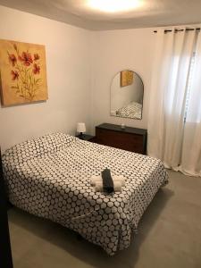 Posteľ alebo postele v izbe v ubytovaní Apartamento Eucalipto