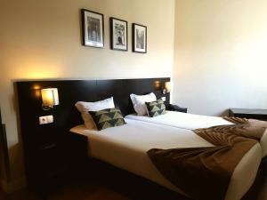 A bed or beds in a room at Lisbon City Hotel by City Hotels Még 37 kép