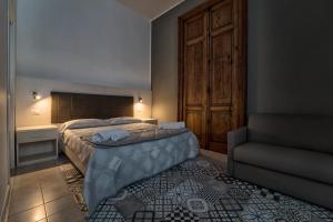 A bed or beds in a room at New Gallery