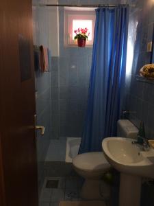 Koupelna v ubytování Cosy Apartments