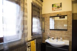 Phòng tắm tại Dolce Conca D'Oro B&B