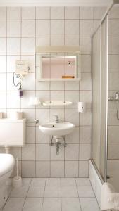 Ванная комната в Landgasthof zum Siebenbachtal