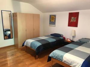 Postel nebo postele na pokoji v ubytování Bed n Breakfast Obermumpf
