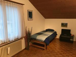 Postel nebo postele na pokoji v ubytování Bed n Breakfast Obermumpf