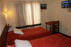 Postel nebo postele na pokoji v ubytování Picol Hostal