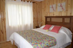 Postel nebo postele na pokoji v ubytování Valle Paraiso