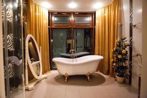 Ванная комната в Триумф Палас Отель