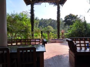 Balkón nebo terasa v ubytování Coorg 4 C's Little Paradise