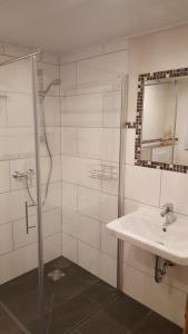 Koupelna v ubytování Ferienwohnung Lohnerlehen + 13 fotografií