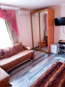 TV a/nebo společenská místnost v ubytování Hotel Om Shanti