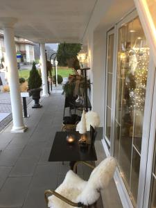 Posezení v ubytování Landcafe mit Mini Hotel