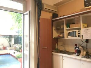
A kitchen or kitchenette at Beautiful Place In Rome
