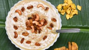 a plate of food with nuts on a green leaf at Bhadra Kali Guest House in Varanasi
