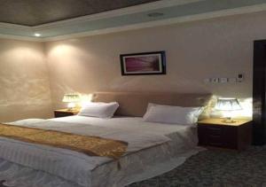 Katil atau katil-katil dalam bilik di Almasah Altaj Aparthotel