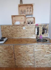 Kuchyň nebo kuchyňský kout v ubytování Apartman Lena