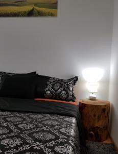 Postel nebo postele na pokoji v ubytování Apartman Lena