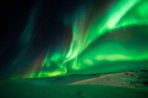 an image of the northern lights in the sky at Hotel Gullfoss in Haukadalur