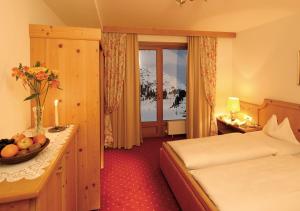 Llit o llits en una habitació de Apartment Alpenland