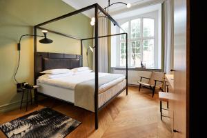 En eller flere senger på et rom på Nobis Hotel Copenhagen, a Member of Design Hotels™