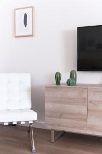 Telewizja i/lub zestaw kina domowego w obiekcie ConK Apartments by CasaTuristica