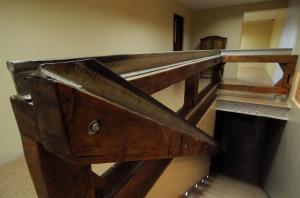 Palanda nebo palandy na pokoji v ubytování Apartamentowiec Kuźniar