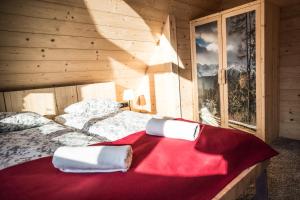 Posteľ alebo postele v izbe v ubytovaní Osada domków TATRA-DREAM