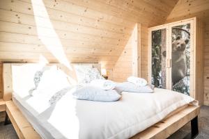 Posteľ alebo postele v izbe v ubytovaní Osada domków TATRA-DREAM