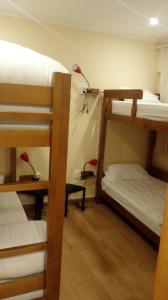 Ein Etagenbett oder Etagenbetten in einem Zimmer der Unterkunft Residencial Condado