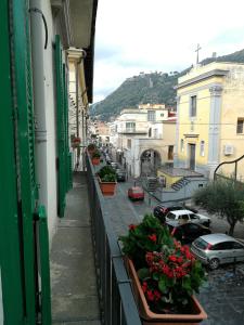 a view of a street with flowers on a balcony at B&B Le Volte in Sarno