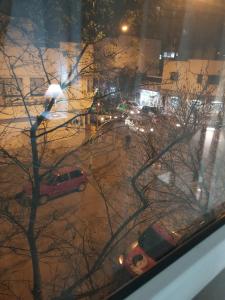 a view from a window of a street at night at M&A Apartamentos Temporales in Bahía Blanca