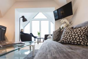 TV a/nebo společenská místnost v ubytování Appartement Auszeit