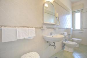 Kúpeľňa v ubytovaní Hotel Amedea