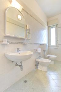 Kúpeľňa v ubytovaní Hotel Amedea