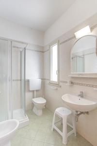 Kúpeľňa v ubytovaní Hotel Amedea
