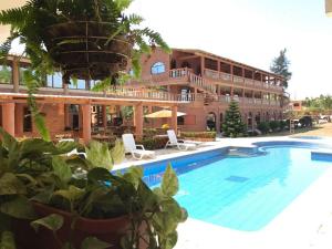 Bazén v ubytování Suite Hotel Romanos nebo v jeho okolí + 9 fotografií