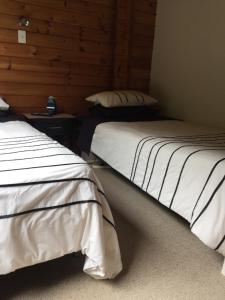 Postel nebo postele na pokoji v ubytování Travellers Retreat B&B