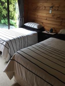 Postel nebo postele na pokoji v ubytování Travellers Retreat B&B