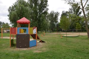 a park with a playground with a play equipment at Vadszilva Apartman in Balatonőszöd