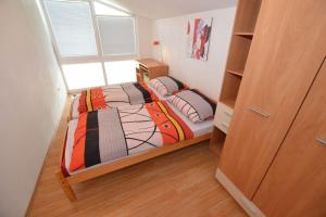 Postel nebo postele na pokoji v ubytování Apartma Štastný