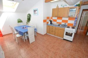 Kuchyň nebo kuchyňský kout v ubytování Apartma Štastný