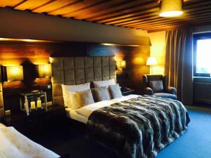 Postel nebo postele na pokoji v ubytování Boutiquehotel Säumler