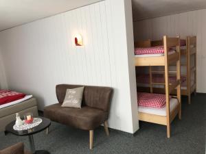 Una cama o camas en una habitación de Berggasthaus First - Only Accessible by Cable Car