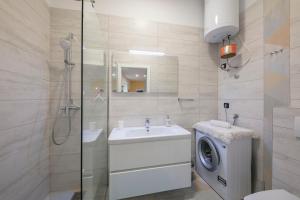 Kúpeľňa v ubytovaní Apartments Villa Adrienne + 35 fotografií
