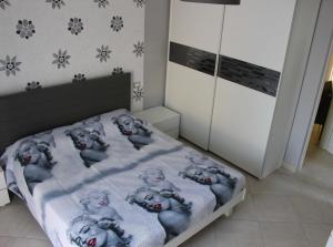 Postel nebo postele na pokoji v ubytování Il Roseto di Daniela