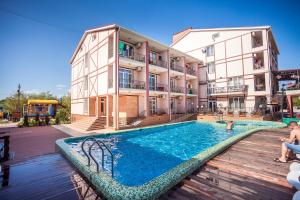 Bazén v ubytování Hotel NATALI nebo v jeho okolí