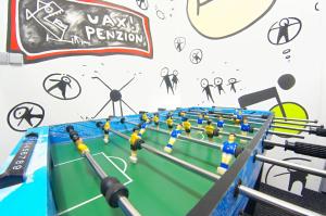 a model of a table soccer game in a room at Penzion UAX in Trojanovice