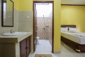 Koupelna v ubytování Nova Homestay Ubud