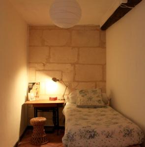Lova arba lovos apgyvendinimo įstaigoje La maison de Lara