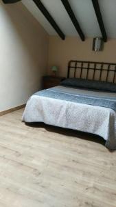 Ein Bett oder Betten in einem Zimmer der Unterkunft La Casina de Felix